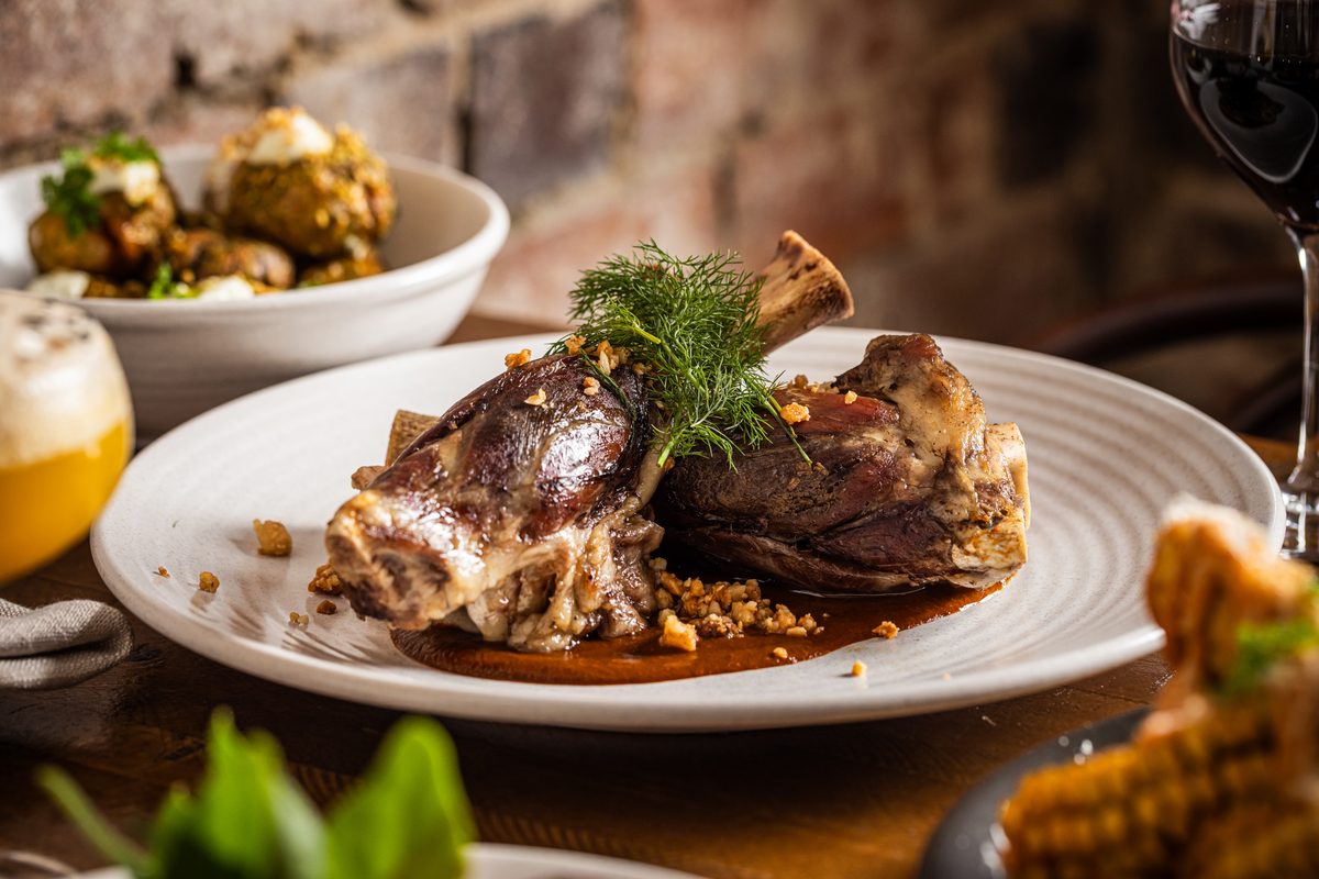 Tommy's Wine and Dine Wednesday lamb shanks with a glass of red wine